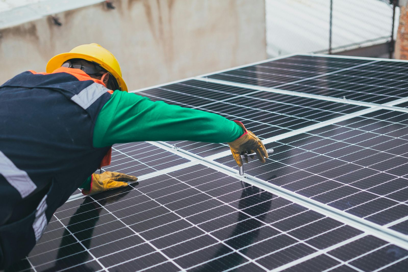 Worker on solar panel